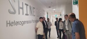 Group Tour outside Level 6 SHINE Lab with SHINE signage -1000029954